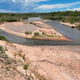 Much of the riverbed is exposed in Bernalillo, New Mexico, some 15 miles north of Albuquerque, on July 21, 2022.
